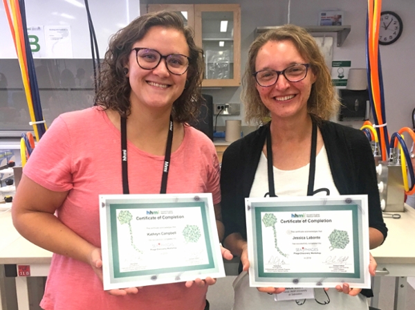 Graduate student Kate Campbell and Dr. Jessica Labonté of the Texas A&M University at Galveston Viral Ecology Laboratory proudly display their certificates of completion at the end of the SEA-PHAGES Discovery workshop, held in Baltimore June 23-28, where they were trained to teach the course.